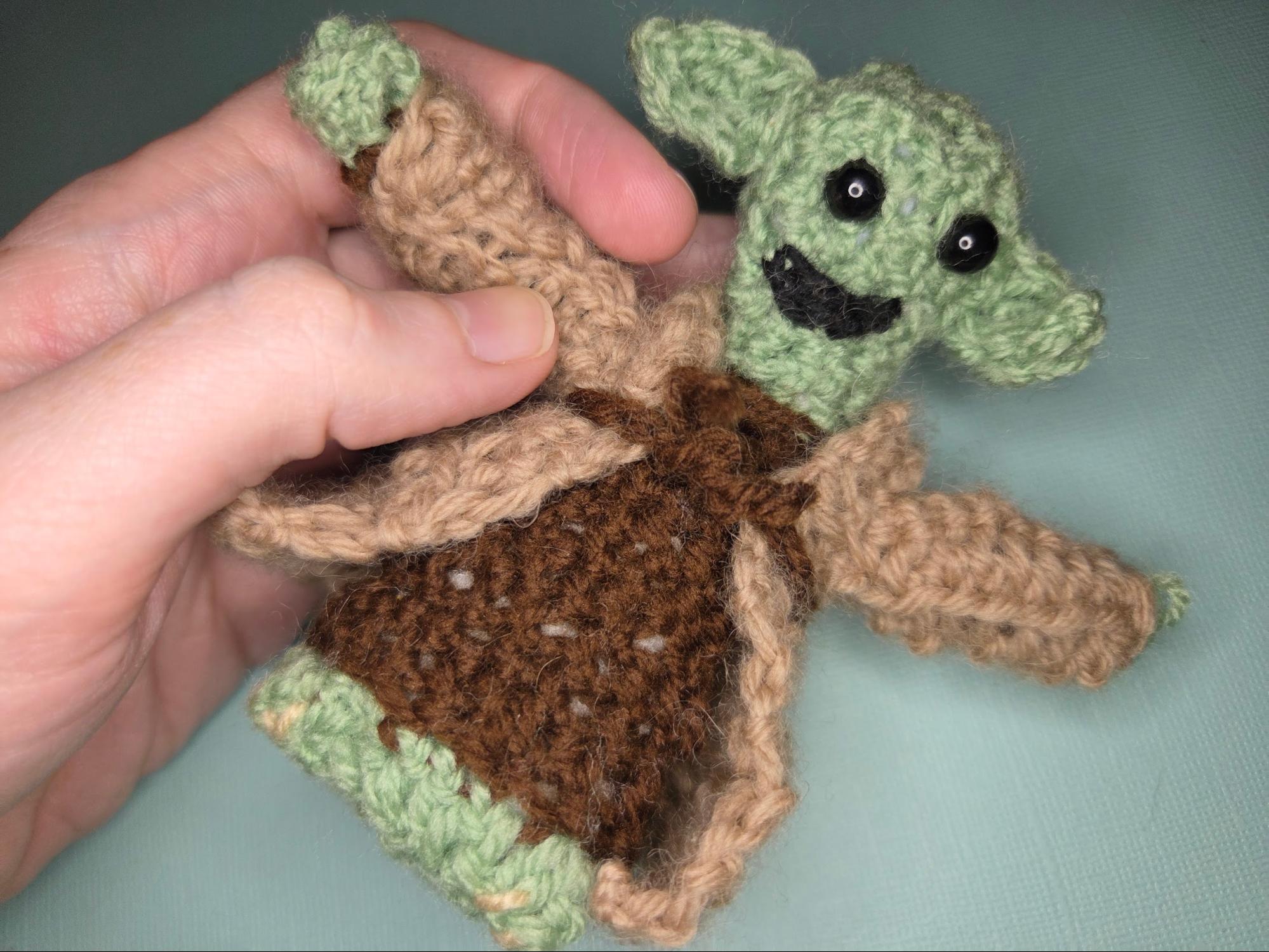 My Journey to crochet with yoda My crochet journey with first crocheted yoda. Light blue background. Starting point to keep growing.