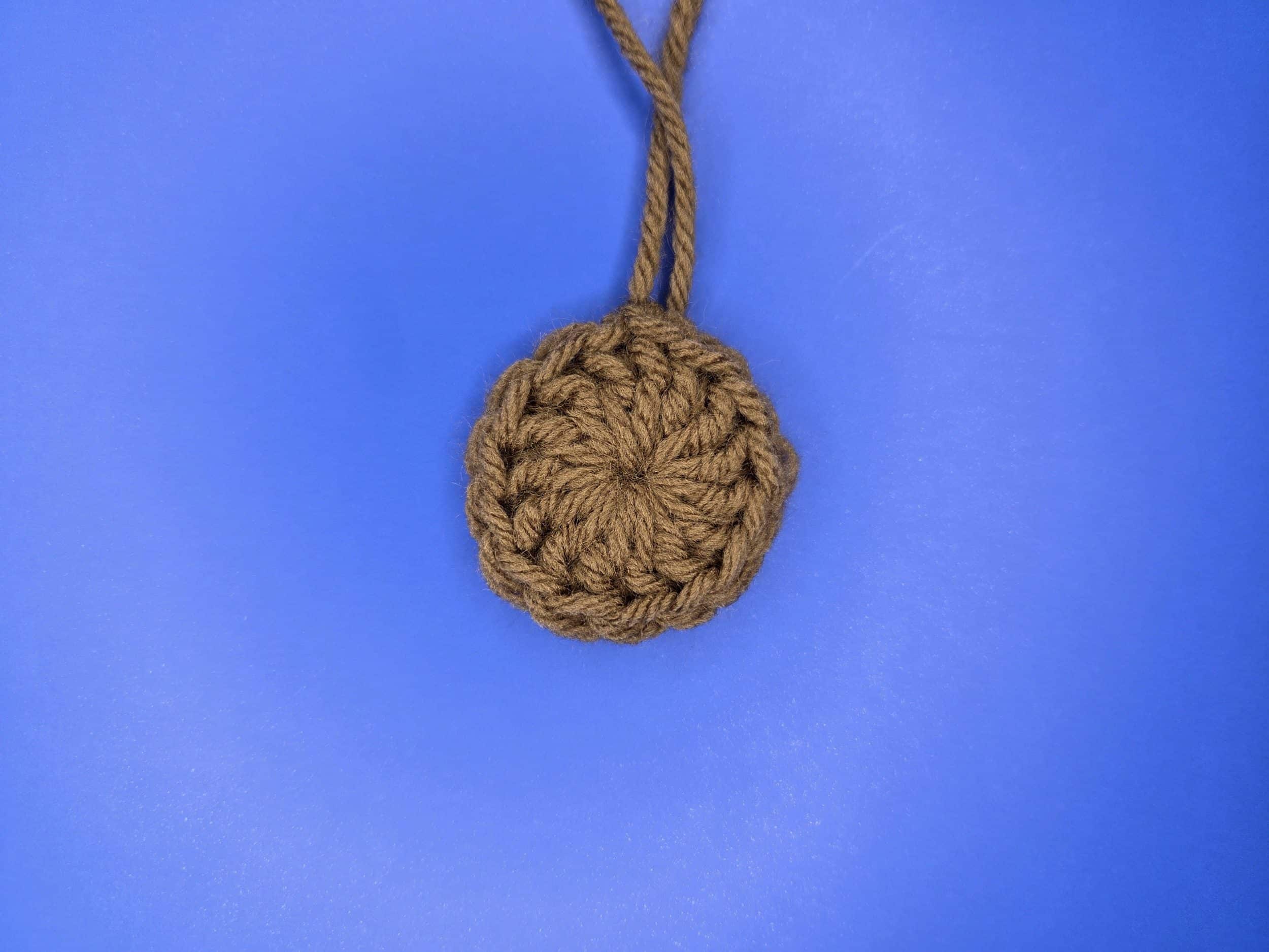 Completed round 1 of free flower crochet granny square pattern