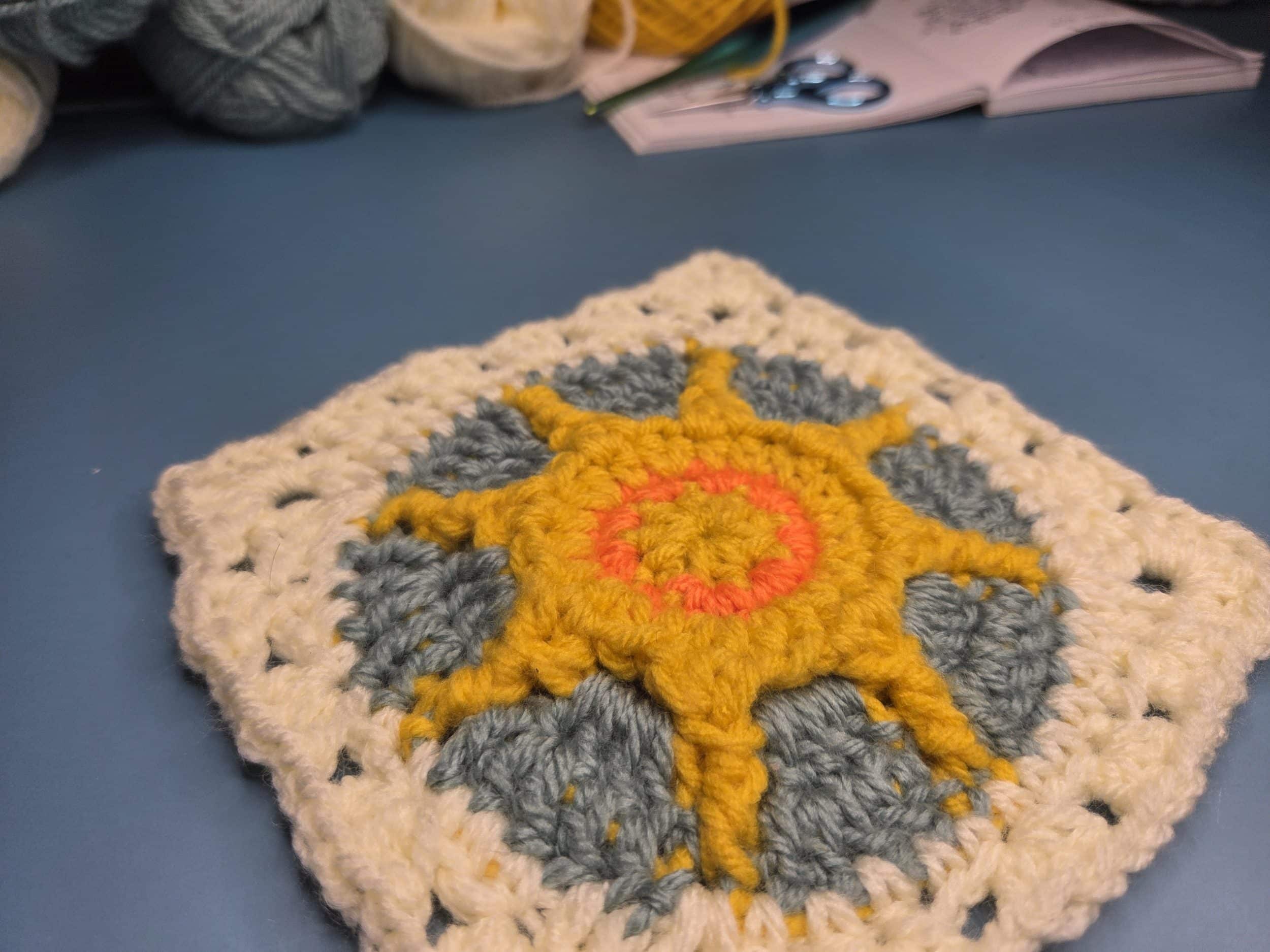 A completed sun granny square.